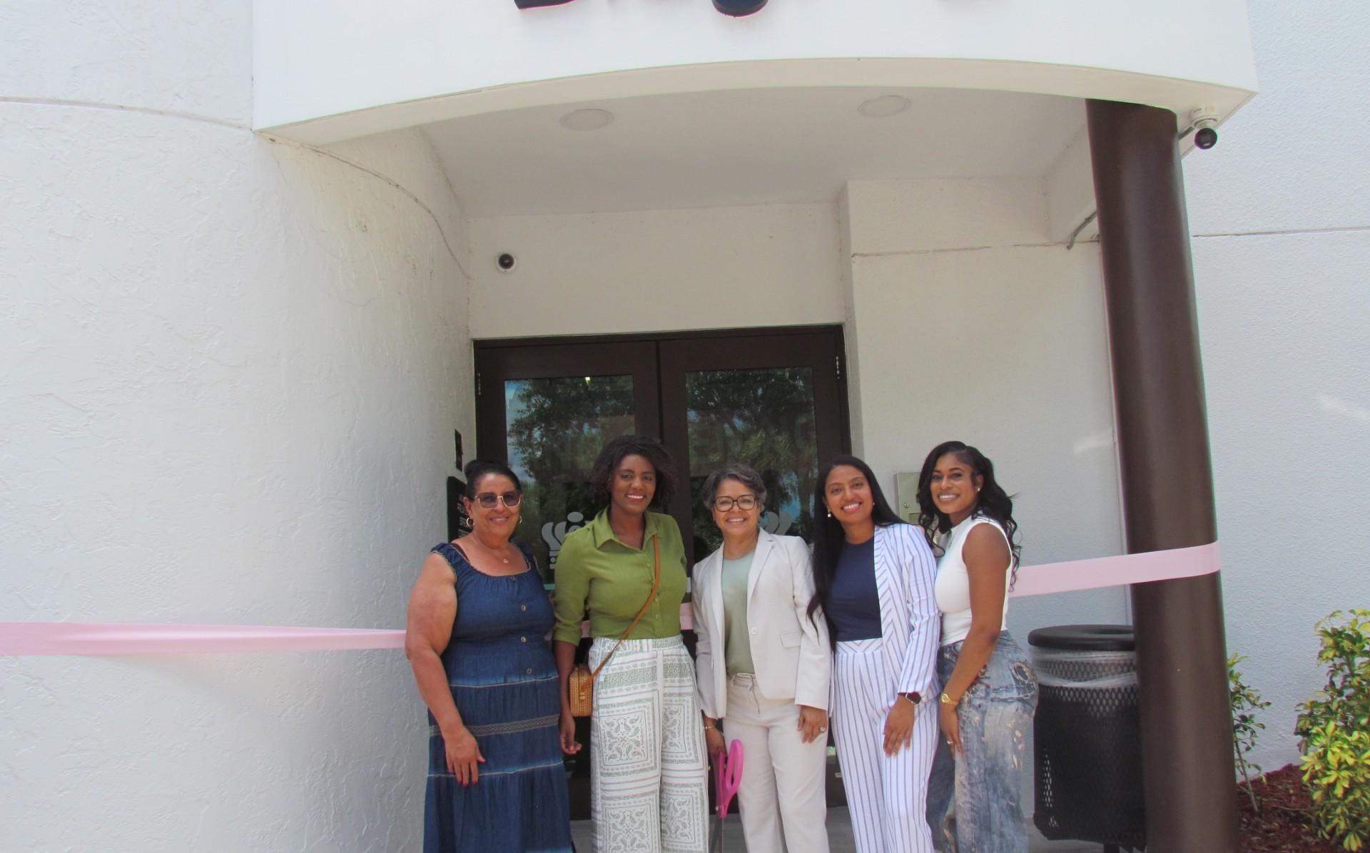 CBA founder and team at ribbon cutting